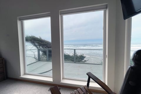 Sit and watch the waves roll in.