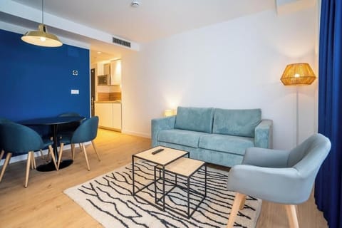Gather for meals and movie nights in this open-plan space.