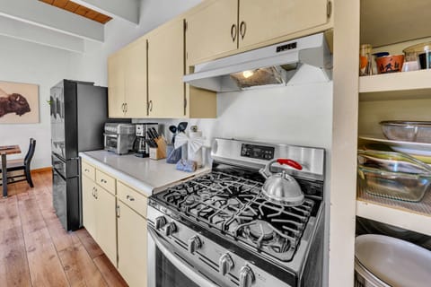 Kitchen: Smaller in size yet fully equip to cook a family meal. Authentic wood-beamed ceilings and vintage cabinetry equipped with a drip coffee maker, toaster, blender, and essential cooking utensils.