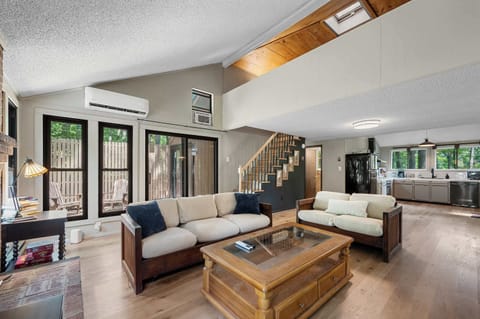 Modern, light-filled cabin in The Woods resort near Berkeley Springs.