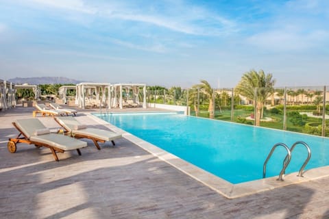 Unwind poolside as panoramic views stretch into the horizon.