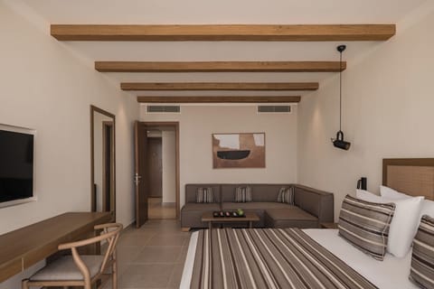 Stretch out in a spacious suite with cozy lounge seating.