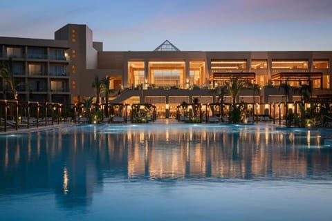Slip into the cool water and drift beside palms.