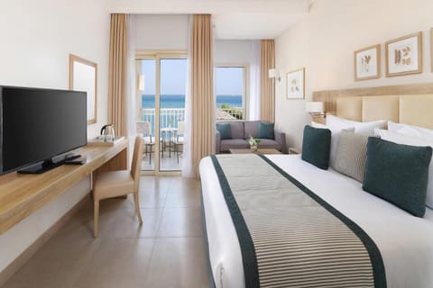 Unwind in crisp linens as the sea breeze drifts in.