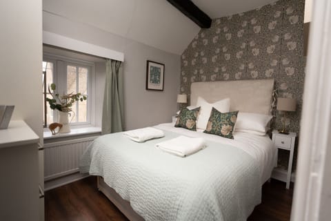 Spacious master bedroom with cosy comfort