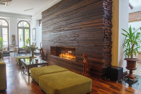 Stretch out with friends beside the statement fireplace wall.