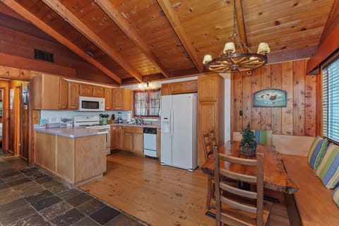 Full kitchen with refrigerator, stove, oven, microwave oven, and dishwasher.