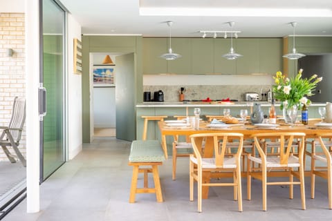 Ground floor: Dining area with access to rear terrace and snug