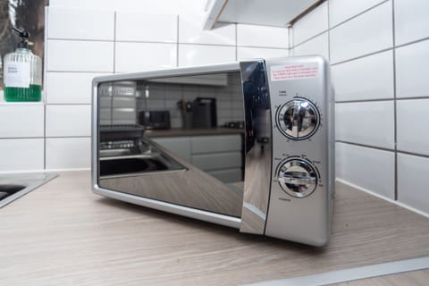 Microwave provided for quick, easy meals - perfect for convenient self-catering during your stay.