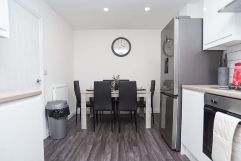 Kitchen/Diner table set with all plates, cutlery and kitchenware — everything you need for easy self-catering and a true home-from-home stay.