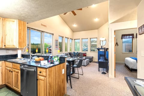 Kitchen island seating blends seamlessly into the dining area for easy meals and conversation.
