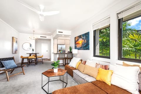 Elegant tropical vacation rental featuring modern design, open living spaces, lush views, and inviting comforts. KGV-20T2