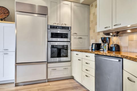 A fully equipped gourmet kitchen with modern appliances has everything you need for cooking your favorite meal. 