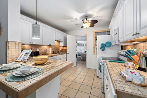 Have a few drinks at the kitchen island while watching the chef in action. 