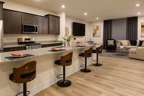 Large  granite island with comfortable seats for easy dining option/ or work area (WFH)
