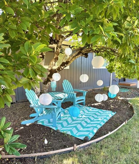 Unwind under a canopy of lanterns & a sparkling blue crystal chandelier!