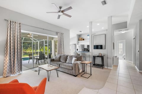 Slider doors to outdoor patio/pool area