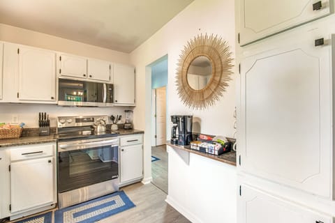 Kitchen | Stainless Steel Appliances with Coffee Bar & Modern White Cabinets