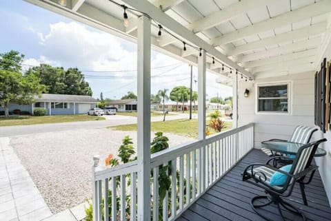 Enjoy your morning cup of coffee from this front porch!