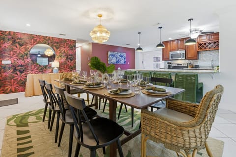 Big table, bigger laughs. Whether it’s family feasts or takeout nights, this dining space was built for togetherness.