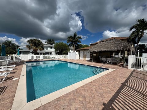 Community Pool Area with Covered Tiki