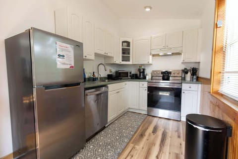 This homes freshly remodeled kitchen is fully equipped for any task, from reheating leftovers to cooking a full thanksgiving dinner