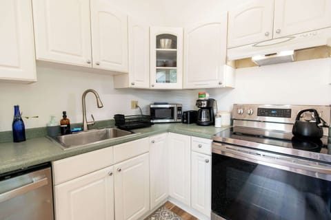 The kitchen has everything you'll need to cook a gourmet meal (or just heat some up some leftover pizza if it's been a long day)