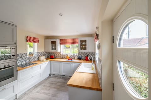 Welcome to Greentiles - enter via the side/ kitchen door