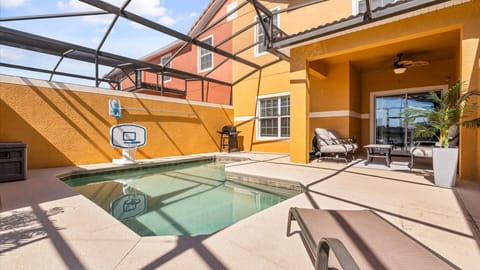 Outdoor Swimming Pool: Enjoy your own screened-in splash pool — perfect for cooling off after a day of adventure.