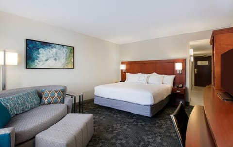 Stretch out on the sofa after sinking into crisp linens.