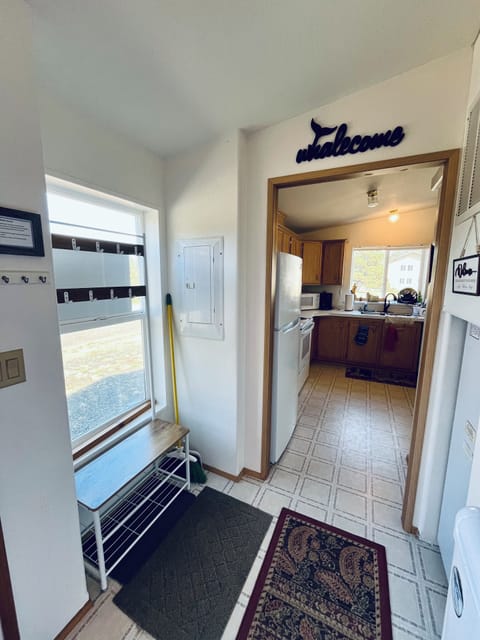 Welcoming entry for boot and coat storage.