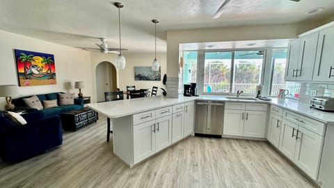 Seating for 2 at the bar, pool view from the kitchen