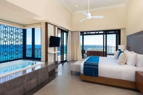 Corner bedroom with jetted soaking tub and incredible views