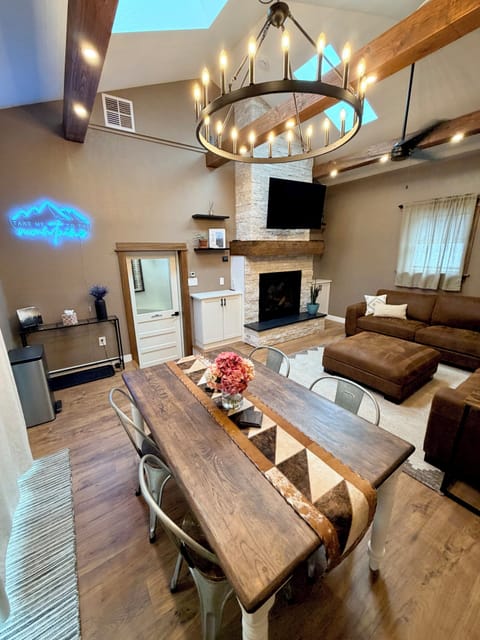 Southwest design. Features a large sectional sofa, and a smart 55 inch TV.