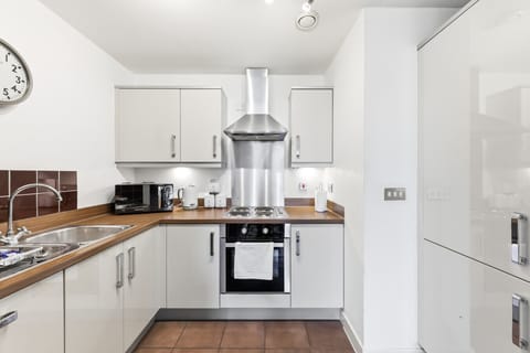 Cook with ease in the fully equipped kitchen, complete with everything you need for preparing home-cooked meals.