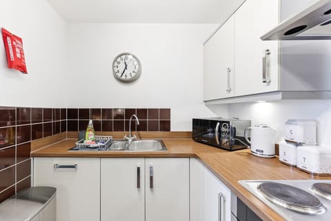 Cook with ease in the fully equipped kitchen, complete with everything you need for preparing home-cooked meals.