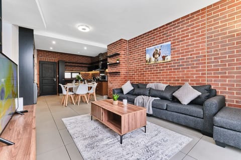 Cosy living room with a stylish blend of modern and rustic design