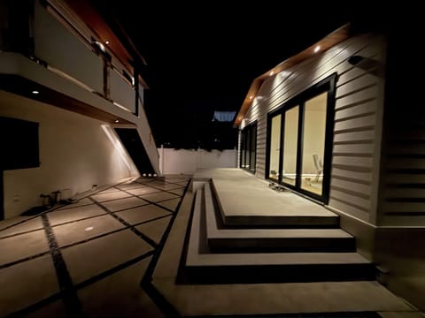 Shared exterior space, front house is owner occupied 