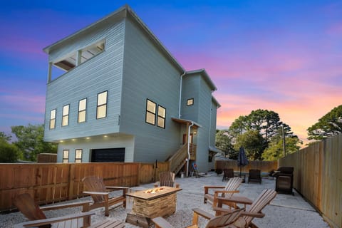 Sunsets and warm starry night evenings over the fire pit and lit up heated pool! Tide + Melody is where you make memories that will last a  lifetime