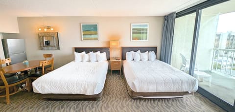 Wake Up to Balcony Views & Cozy Queen Beds!