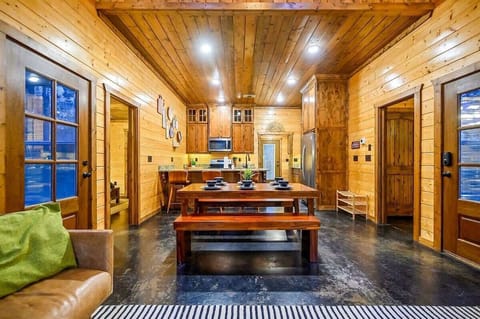 Bright, open layout with a rustic wood dining table perfect for shared moments.