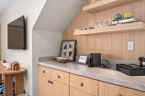 Our dedicated coffee nook is a guest favorite, offering a cozy and convenient spot to enjoy your morning ritual. Equipped with a Keurig, drip coffee maker, mugs, tea, and condiments, this space is stocked with all the essentials.