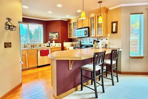 Let the conversations begin at the bar in the kitchen
