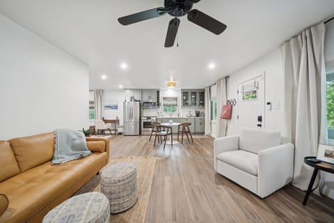 The leather sofa offers a cozy spot to kick your feet up and relax.