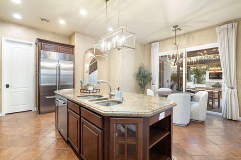 Bright primary suite w/ elegant furnishings & an open, airy layout