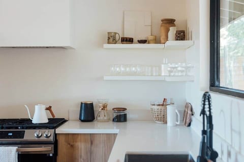 Organic pour-over coffee, organic tea-press and water kettle allow you to transition into your day.