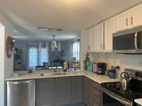 Big kitchen w/ new appliances—open to dining / living for seamless gatherings.