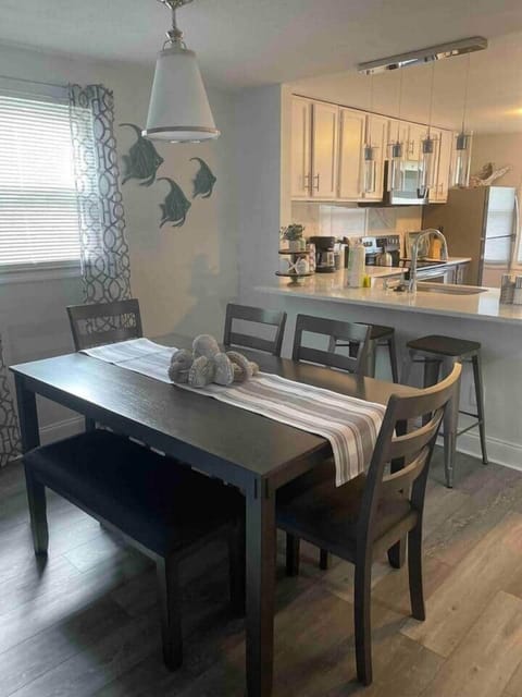 Breakfast bar provides extra seating to complement the dining room.