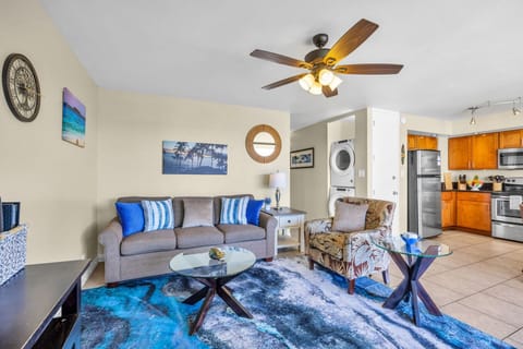 Relax in coastal-chic style with ocean blues and natural light.