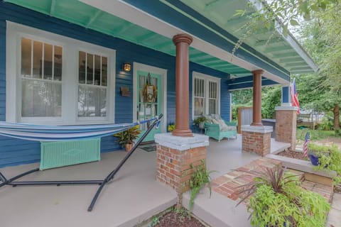 Sip morning coffee on relaxing front porch with hammock before walking to nearby East Hill cafes and downtown Pensacola attractions.